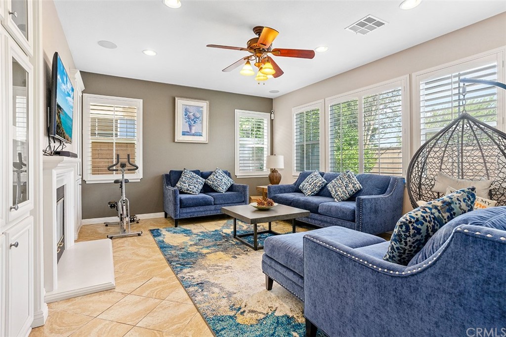 12547 Vintner Drive Rancho Cucamonga, CA 91739 - Photo 11 of 52 a living room with furniture and a large window