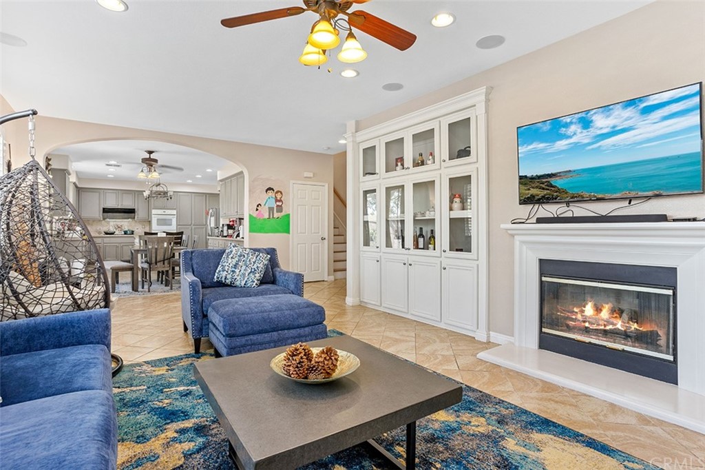 12547 Vintner Drive Rancho Cucamonga, CA 91739 - Photo 13 of 52 a living room with furniture and a fireplace