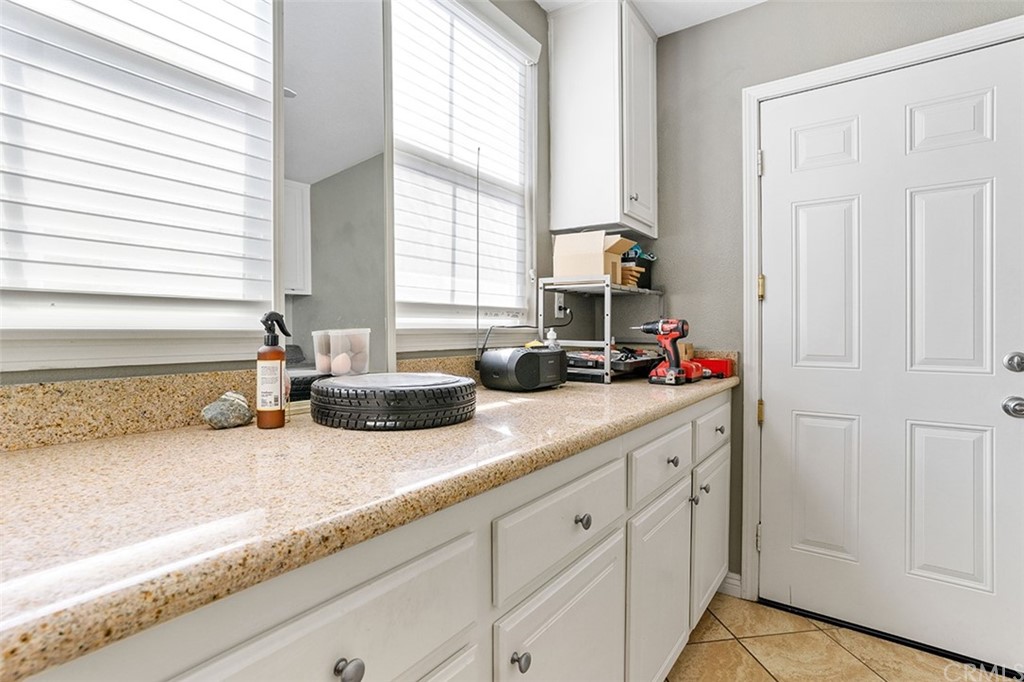 12547 Vintner Drive Rancho Cucamonga, CA 91739 - Photo 24 of 52 a kitchen with sink and window