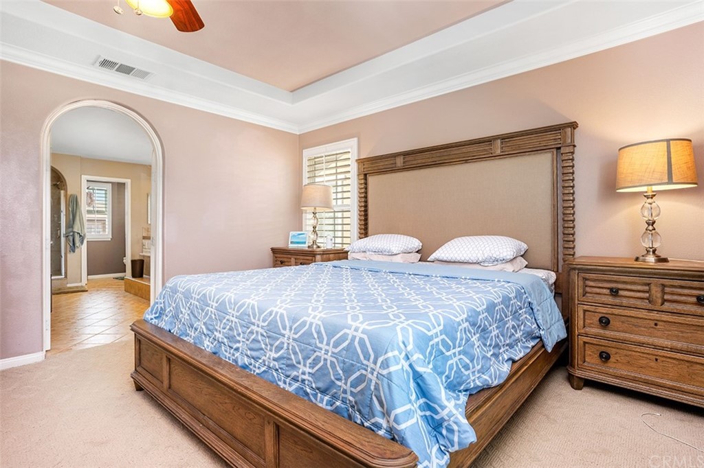 12547 Vintner Drive Rancho Cucamonga, CA 91739 - Photo 30 of 52 a bedroom with a bed and window