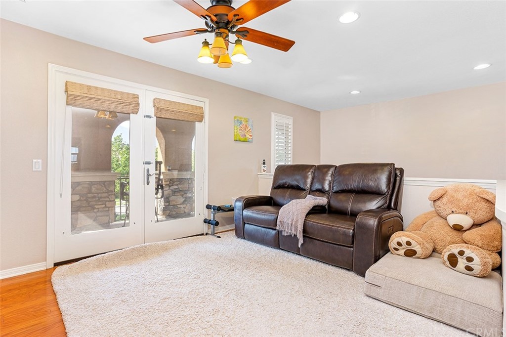 12547 Vintner Drive Rancho Cucamonga, CA 91739 - Photo 39 of 52 a living room with furniture and a large window