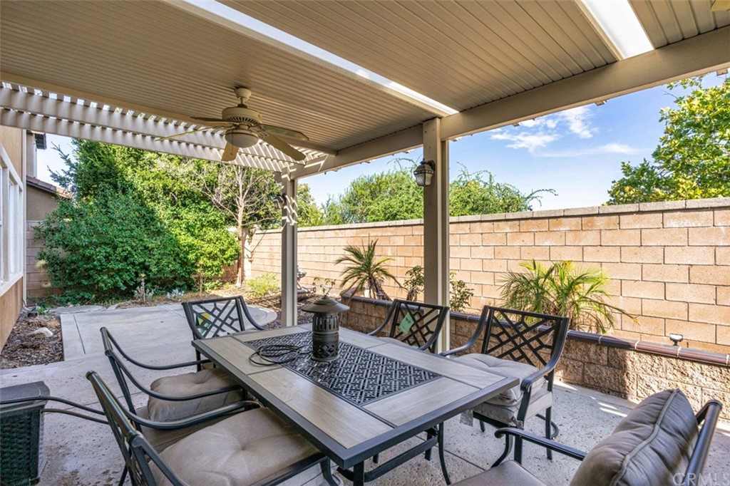 12547 Vintner Drive Rancho Cucamonga, CA 91739 - Photo 45 of 52 a view of a patio with a table chairs and a table