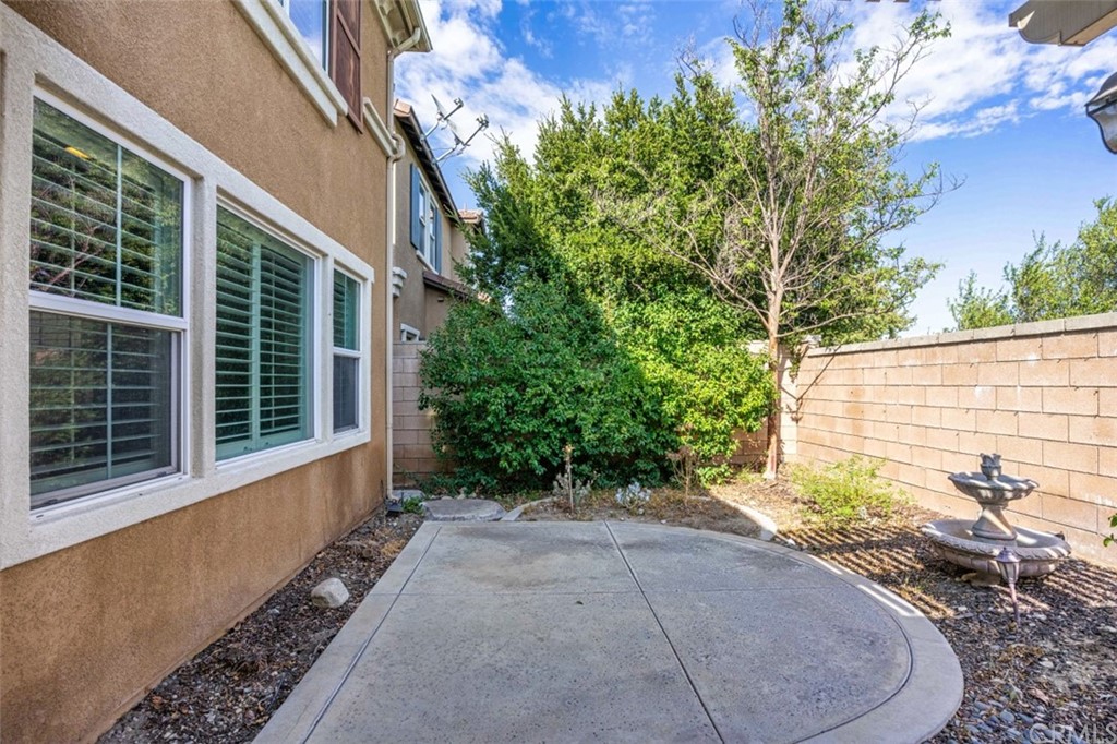 12547 Vintner Drive Rancho Cucamonga, CA 91739 - Photo 49 of 52 a front view of a house with a yard