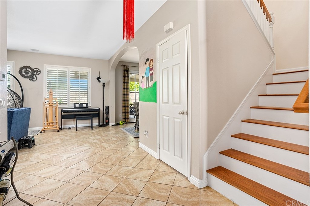 12547 Vintner Drive Rancho Cucamonga, CA 91739 - Photo 9 of 52 a view of a livingroom with furniture and a window