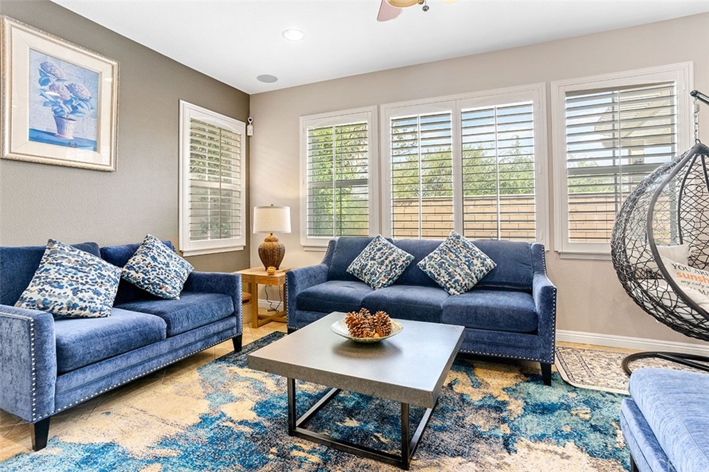 12547 Vintner Drive Rancho Cucamonga, CA 91739 - Photo 10 of 52 a living room with furniture and a large window