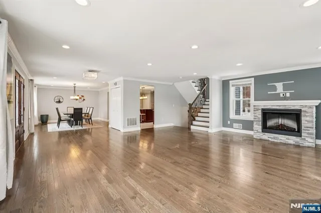 a view of dining room with furniture and wooden floor