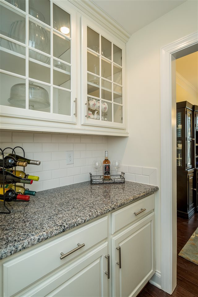 5616 Wade Park Boulevard Raleigh, NC 27607 - Photo 11 of 30 Butler pantry for additional kitchen/bar storage! Conveniently between dining room and kitchen! Butler Pantry