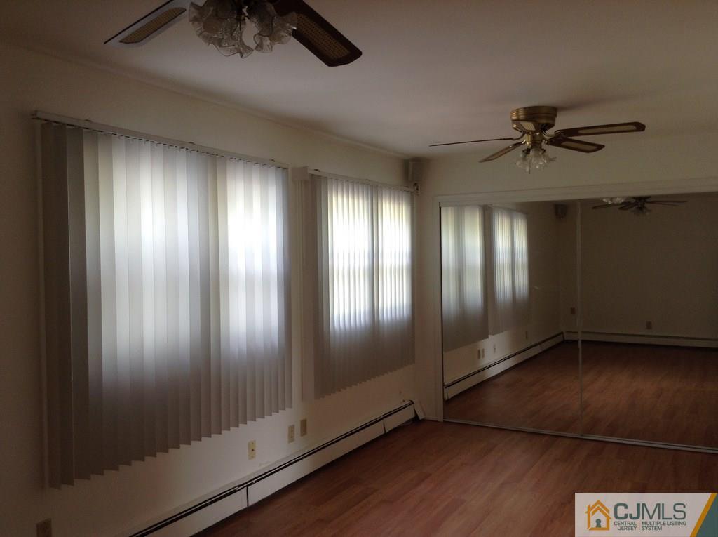 25 Cambridge Road Edison, NJ 08817 - Photo 6 of 13 a view of an empty room with a window