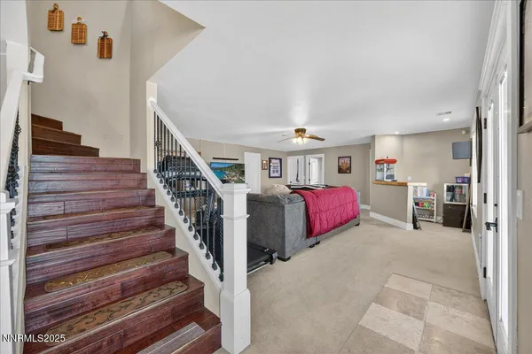 an aerial view of houses with swimming pool