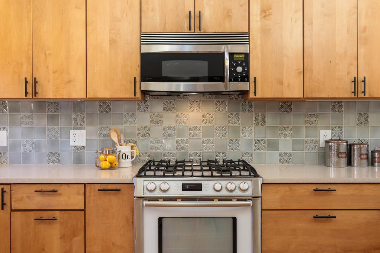 155 Alice Avenue Campbell, CA 95008 - Photo 13 of 36 a kitchen with a stove and a microwave