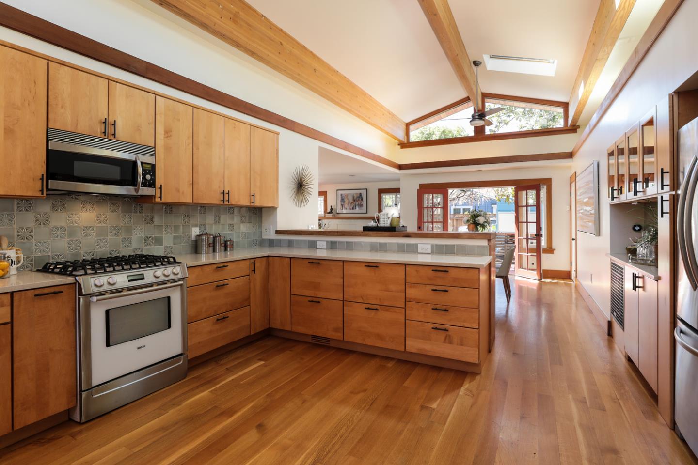 155 Alice Avenue Campbell, CA 95008 - Photo 14 of 36 a kitchen with stainless steel appliances granite countertop a stove and cabinets