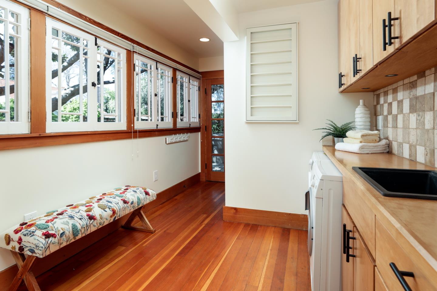 155 Alice Avenue Campbell, CA 95008 - Photo 15 of 36 a kitchen with granite countertop a stove and a wooden floor