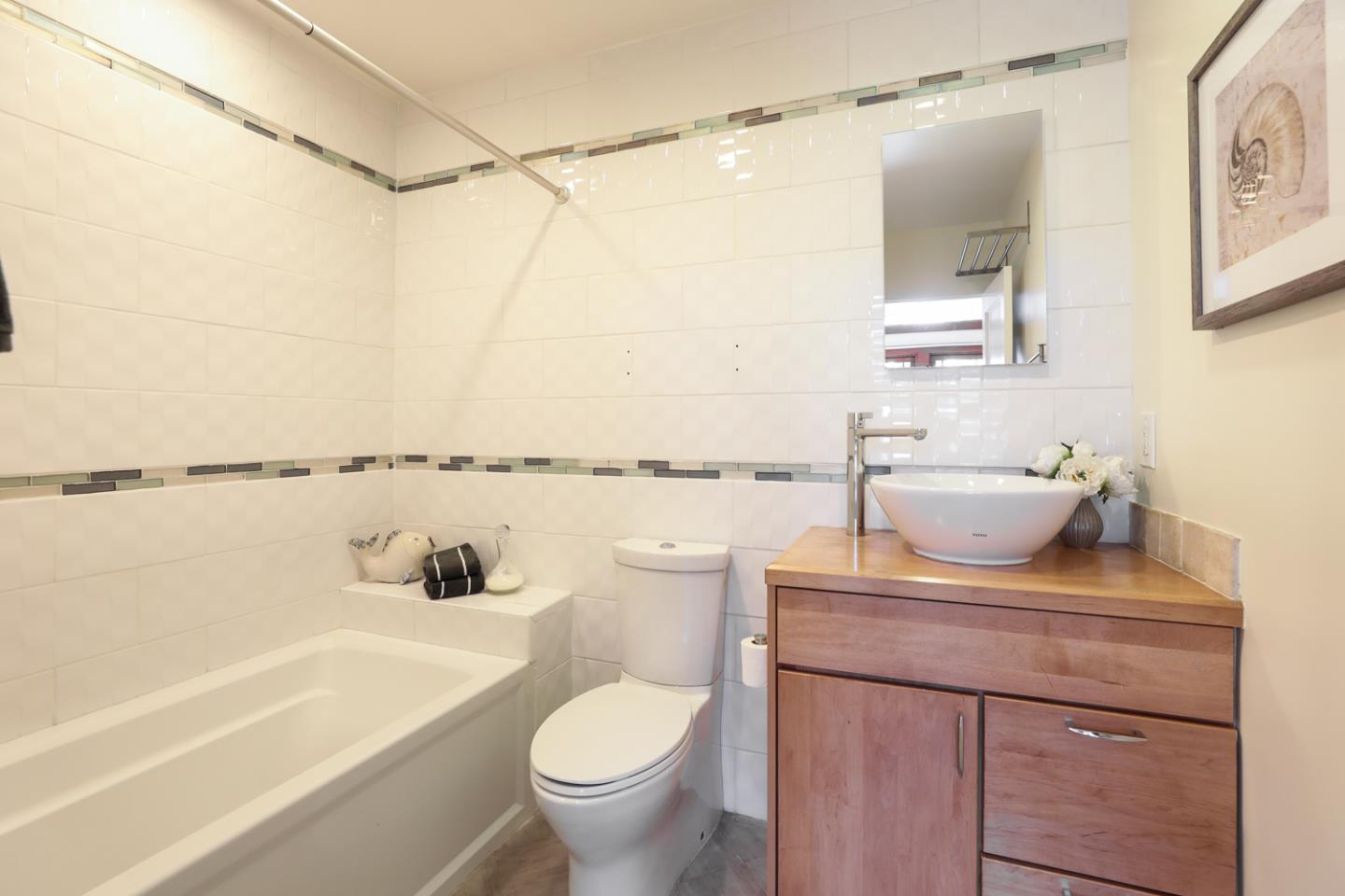 155 Alice Avenue Campbell, CA 95008 - Photo 22 of 36 a bathroom with a sink a toilet and shower