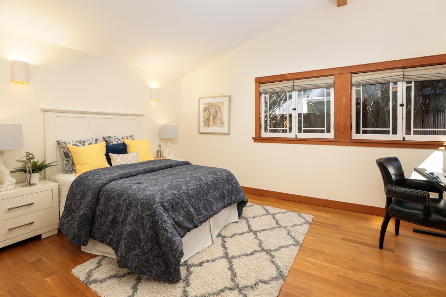 155 Alice Avenue Campbell, CA 95008 - Photo 24 of 36 a bedroom with a bed and wooden floor