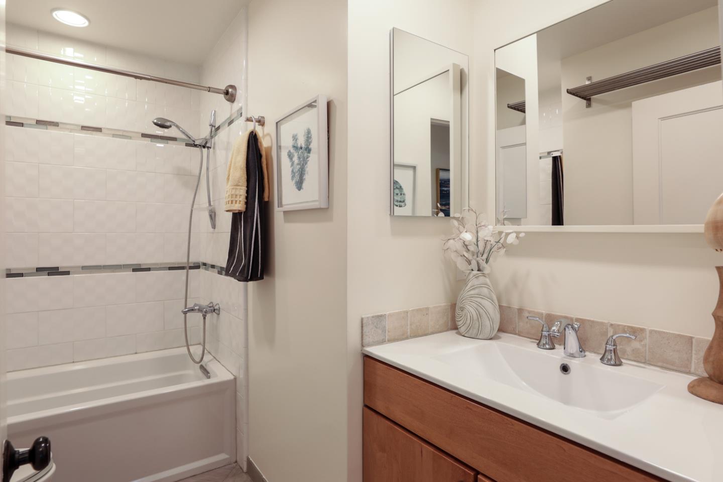 155 Alice Avenue Campbell, CA 95008 - Photo 26 of 36 a bathroom with a sink and a mirror