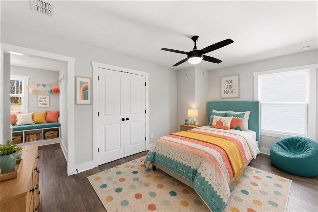 139 Old Alabama Road Southeast Emerson, GA 30137 - Photo 32 of 50 a bedroom with a bed and a chandelier