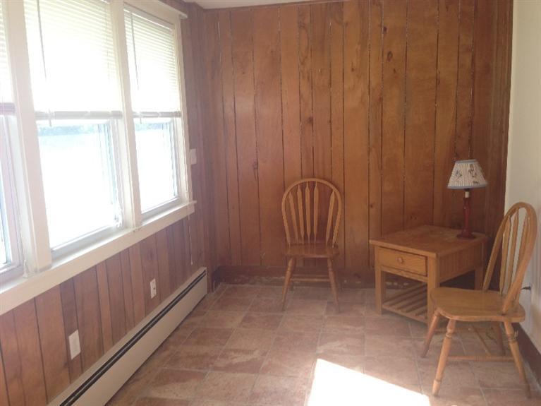 16 Chestnut Street Hyannis, MA 02601 - Photo 6 of 11 a view of a room with a chair and a window
