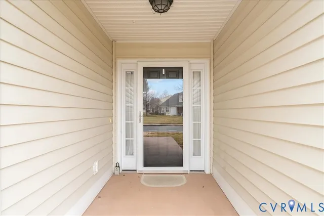 a bed room with a bed and a chandelier