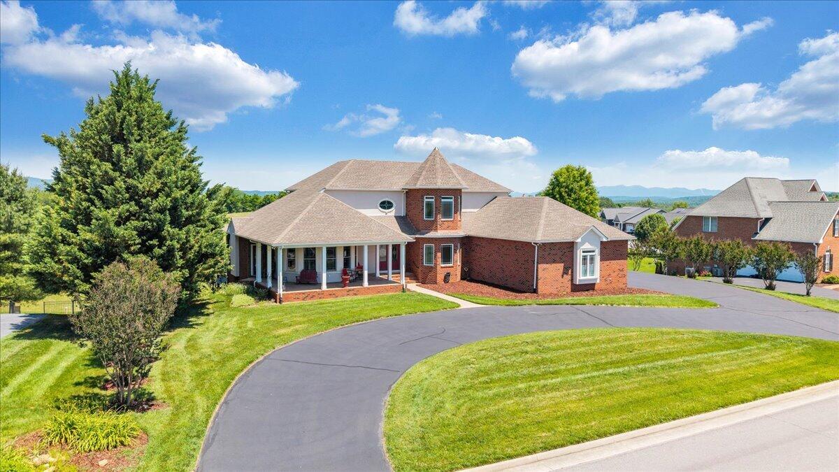 625 Frontier Way Fincastle, VA 24090 - Photo 78 of 105 a view of a house with a big yard and large trees