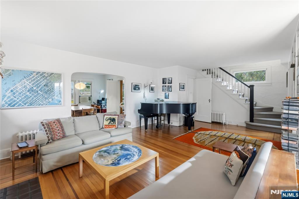 69 Sussex Road Tenafly, NJ 07670 - Photo 13 of 39 a living room with furniture and a rug