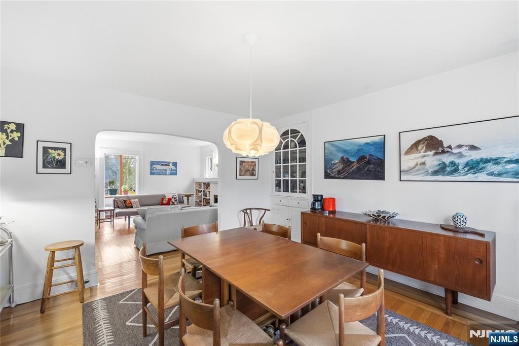 69 Sussex Road Tenafly, NJ 07670 - Photo 14 of 39 a view of a dining room with furniture and wooden floor