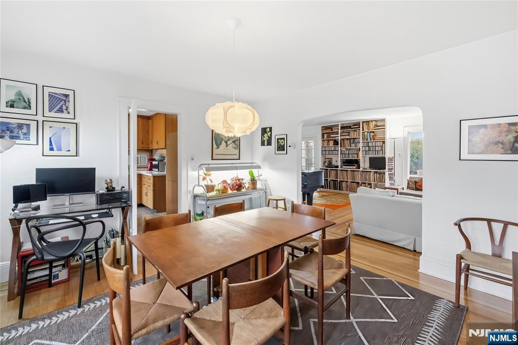 69 Sussex Road Tenafly, NJ 07670 - Photo 15 of 39 a view of a dining room with furniture and a window