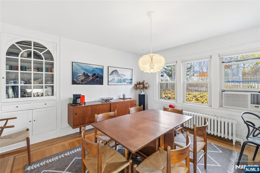 69 Sussex Road Tenafly, NJ 07670 - Photo 16 of 39 a view of a dining room with furniture window and outside view
