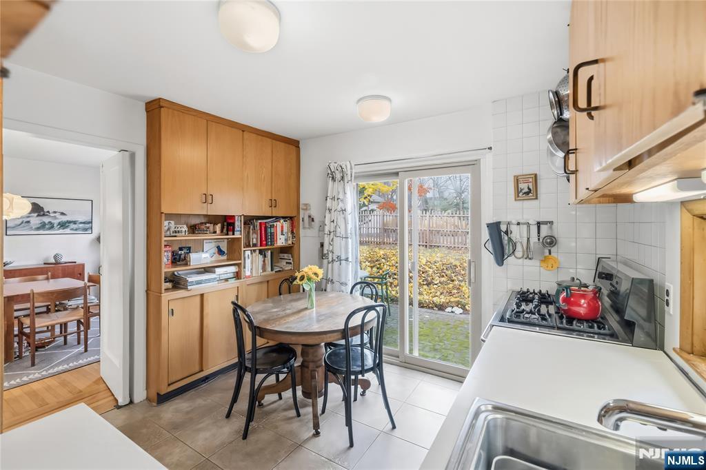 69 Sussex Road Tenafly, NJ 07670 - Photo 17 of 39 a room with a workspace and a window