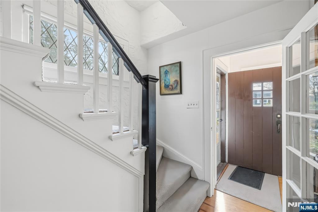 69 Sussex Road Tenafly, NJ 07670 - Photo 26 of 39 a view of entryway and hall with wooden floor