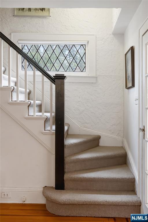 69 Sussex Road Tenafly, NJ 07670 - Photo 27 of 39 a view of entryway and hall with wooden floor