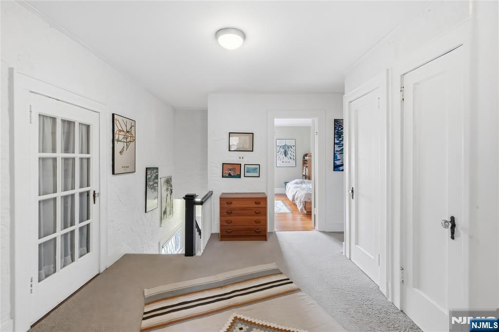 69 Sussex Road Tenafly, NJ 07670 - Photo 28 of 39 a bedroom with furniture and window