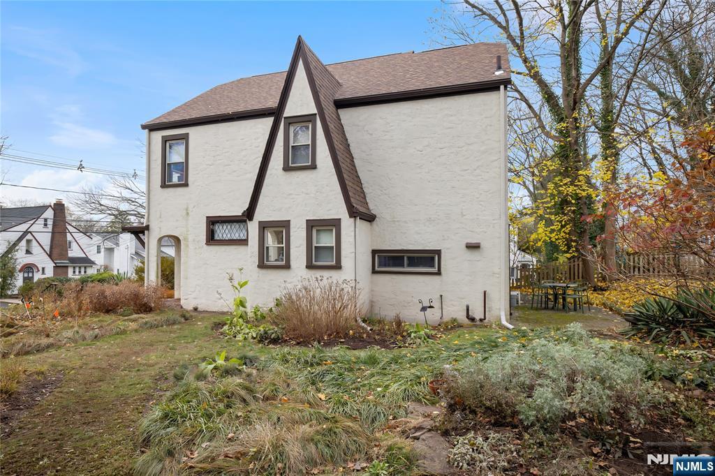 69 Sussex Road Tenafly, NJ 07670 - Photo 5 of 39 a view of a house with backyard
