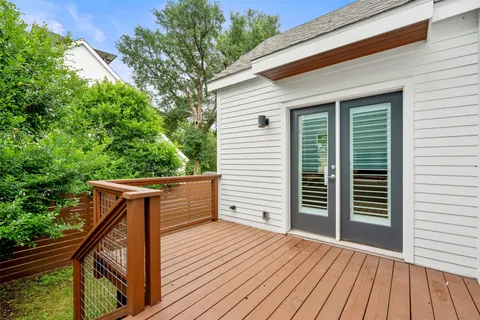 a view of deck with wooden floor and fence