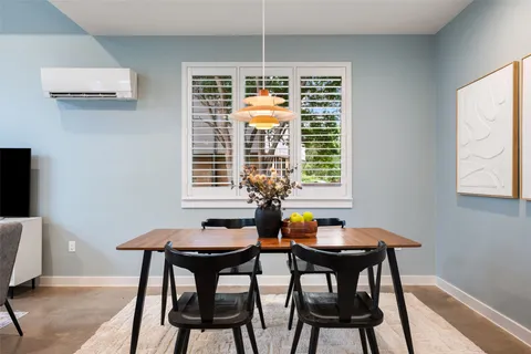 a table and chairs in a room