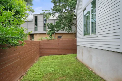 a view of a backyard with plants