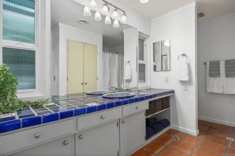 a bathroom with a bathtub and a sink