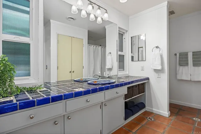 a bathroom with a bathtub and a sink
