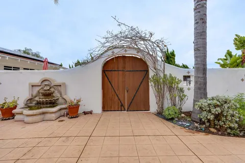 a backyard of a house with lots of green space