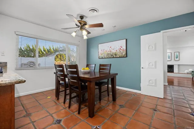 a kitchen with stainless steel appliances granite countertop a refrigerator stove and sink