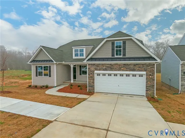 a front view of a house with yard