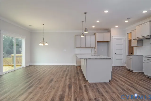 wooden floor and kitchen view