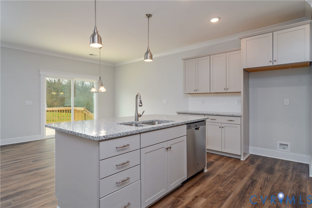 2004 Swiss Lane Hayes, VA 23072 - Photo 4 of 10 a kitchen with sink and cabinets
