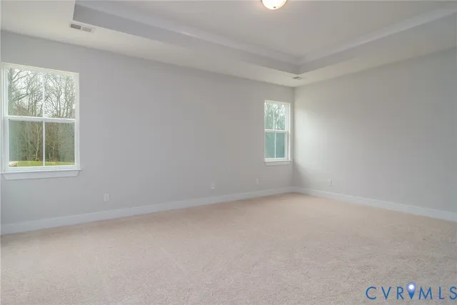 a bathroom with a sink toilet vanity and shower