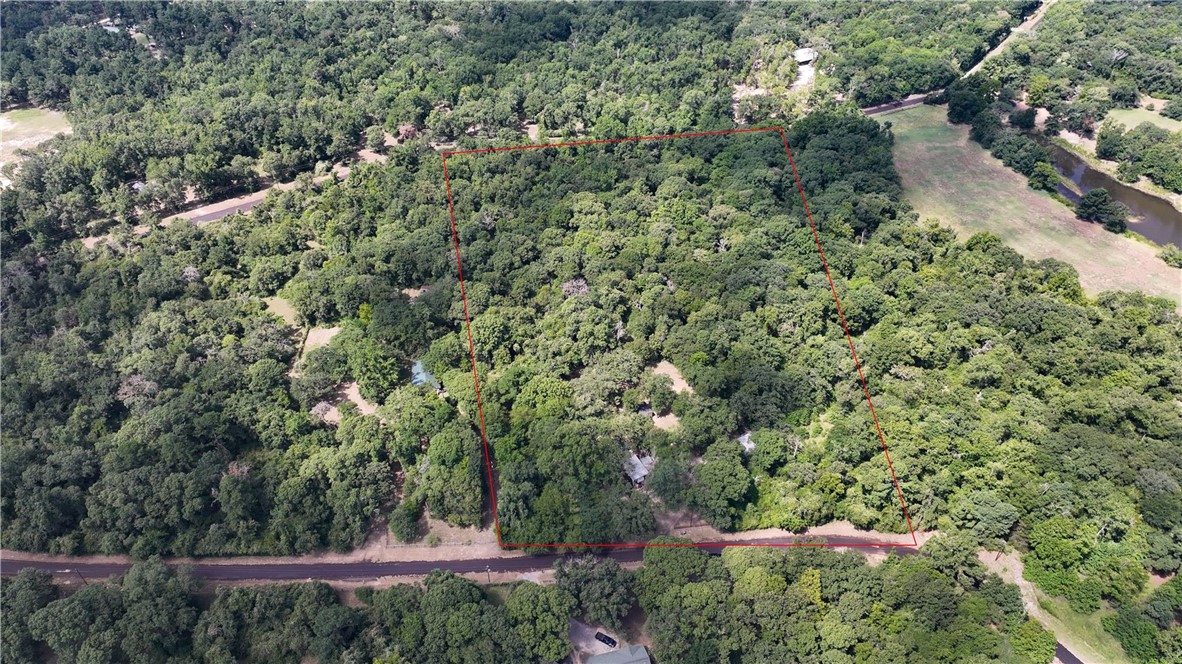 12255 County Road Centerville, TX 75833 - Photo 25 of 26 an aerial view of a house with a yard