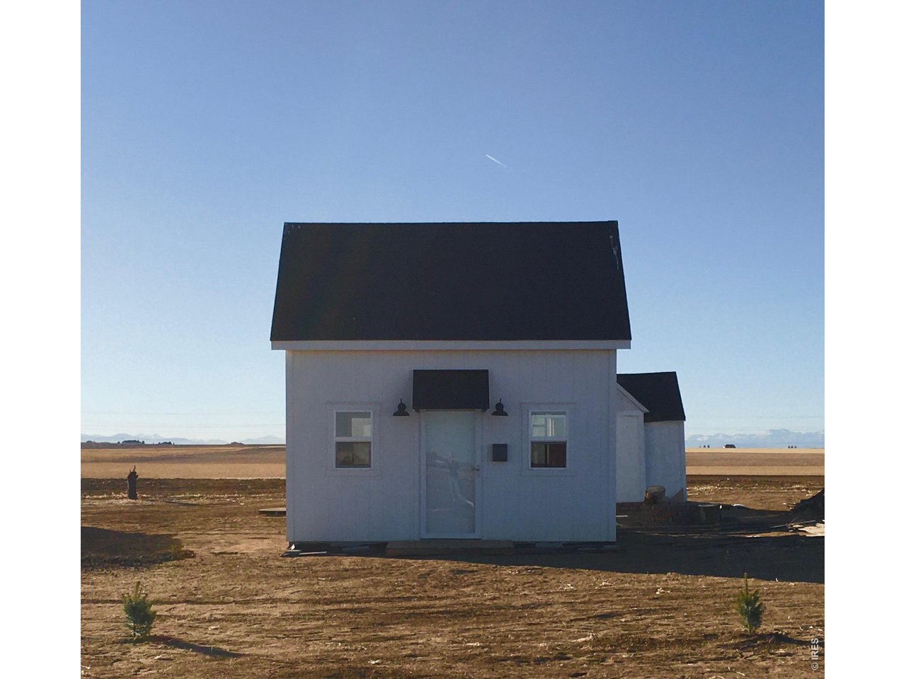 8551 Flint Ridge Street Bennett, CO 80102 - Photo 2 of 8 a view of an ocean