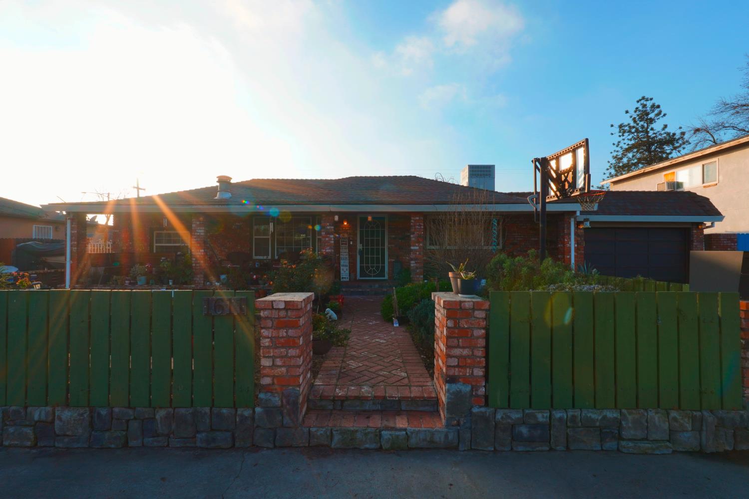 1611 Cameo Way Modesto, CA 95350 - Photo 1 of 1 a view of a chairs and table in the backyard