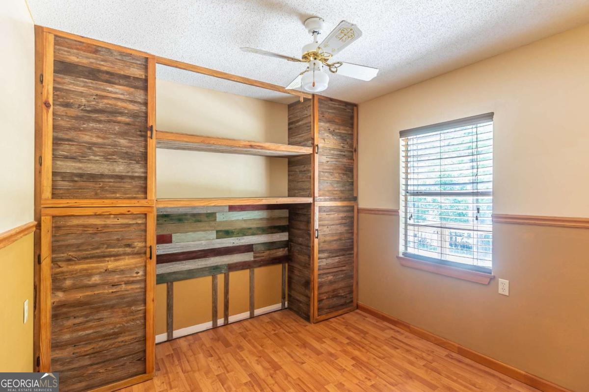 1656-t O To Jones Road Reidsville, GA 30453 - Photo 15 of 22 a view of workspace with furniture and a window