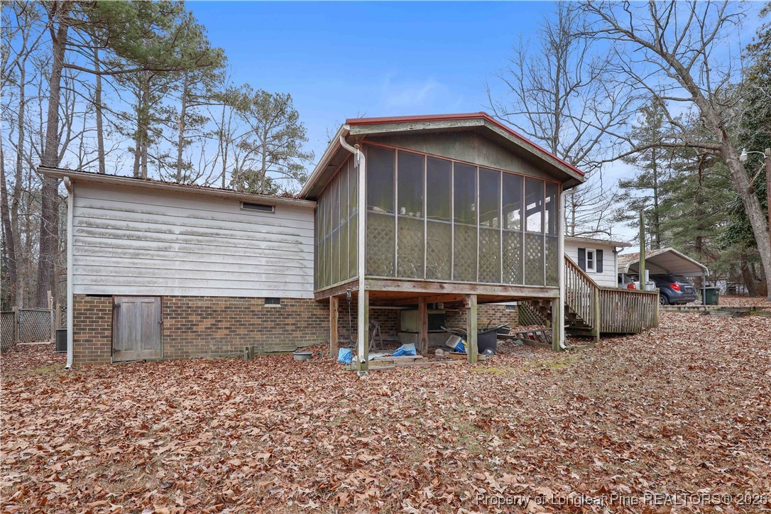 156 Connell Road Carthage, NC 28327 - Photo 27 of 43 a front view of a house with garden
