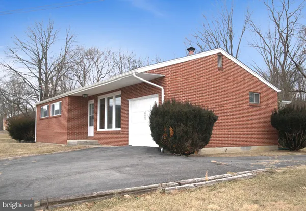 a house view with a outdoor space