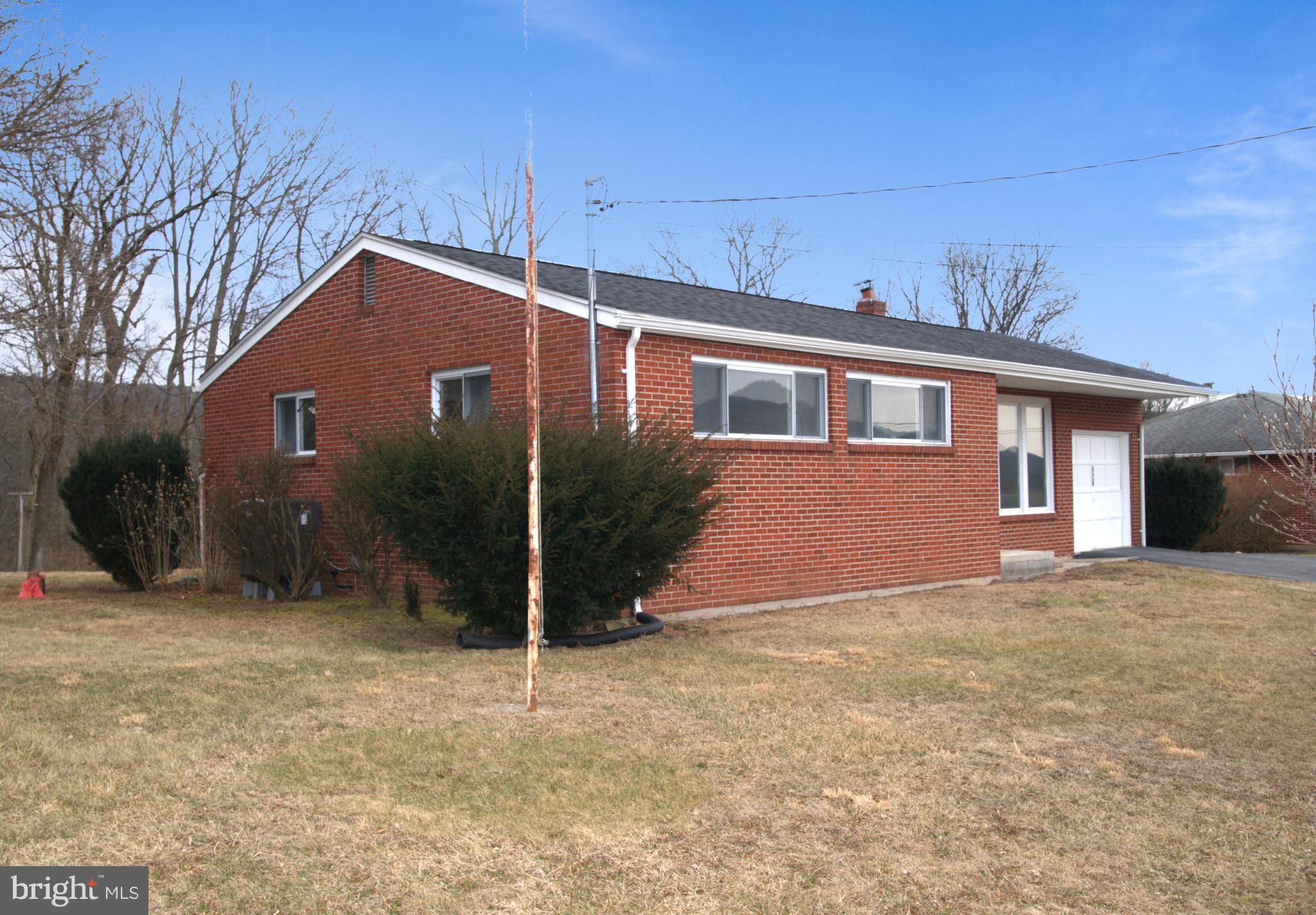 2226 Hyndman Road Hyndman, PA 15545 - Photo 3 of 15 a front view of a house with a yard
